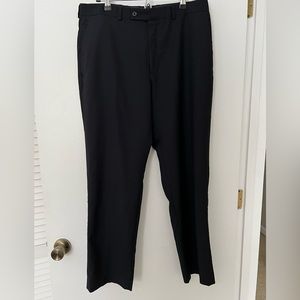 Calvin Klein dress slacks, men’s size 33W x 30L. Navy pinstripe.